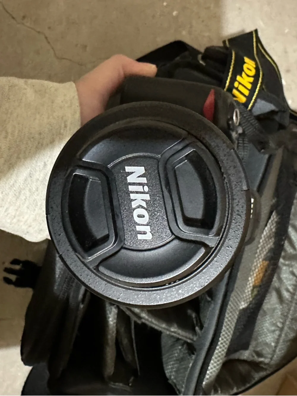 Nikon D3100 DSLR Camera Kit in Black and Yellow-Accented Strap
